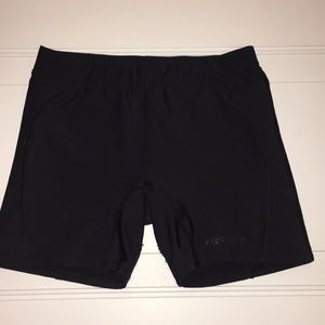 Black Under armor sliding shorts for softball